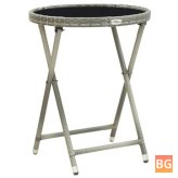 Gray Table with Rattan and Glass