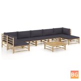 Garden Lounge Set with Dark Gray Cushions and Bamboo Floors
