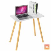 Table with Wooden Legs and a Macbook Pad