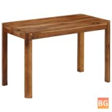 Dining table with a solid wood top and base