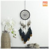 Dreamcatcher ornament with natural feathers