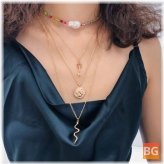 Multi- Layer Rice Beaded Pearl Necklace with Trendy Geometric Key
