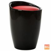 Storage stool in black and red faux leather