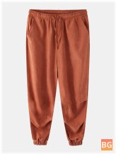 Pants with a Solid Color Pleat