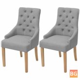 Chairs in fabric with light gray color