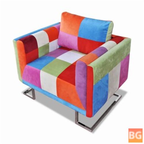 Armchair with chrome legs and patchwork design