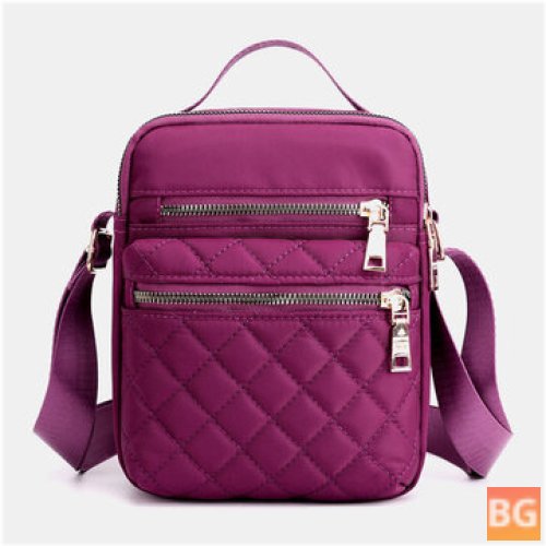 Women's shoulder bag with a water resistant and multi-pocket design