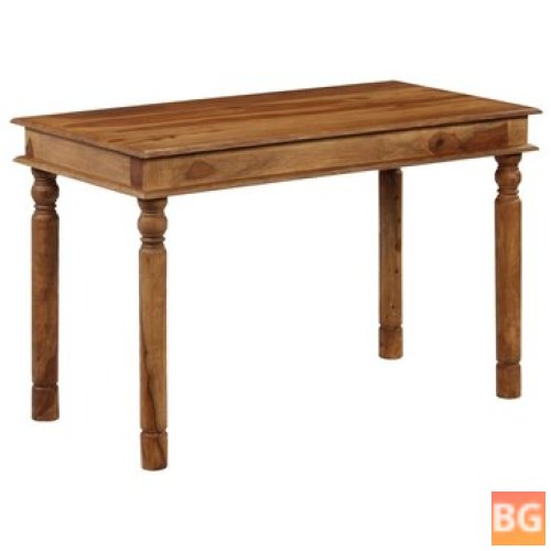 Dining table with wood legs and a solid sheesham top