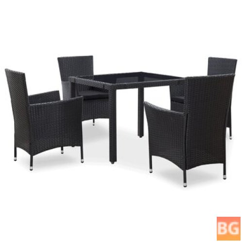 Outdoor Dining Set With Rattan And Black Fabric