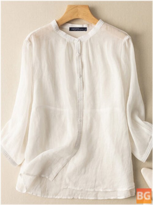 Button-Down Blouse with a Solid Button Hem
