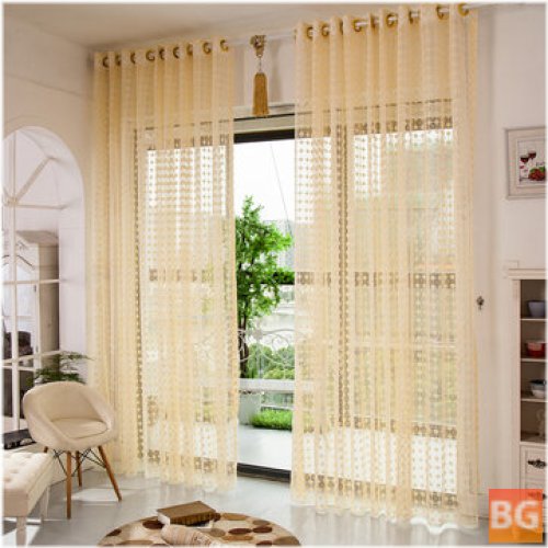 Sheer Tulle Curtains for a Hollow Out Bedroom