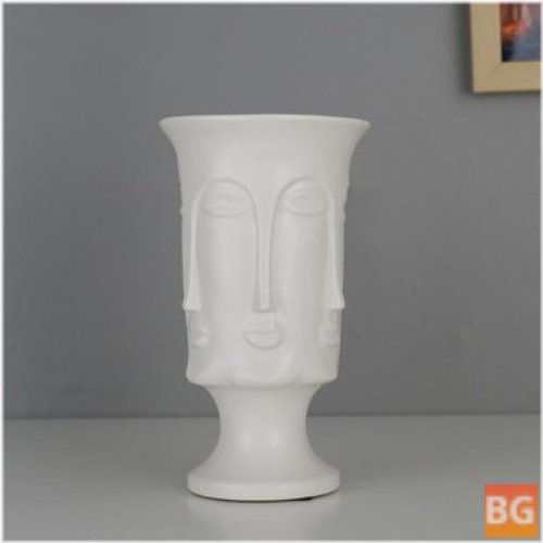 Human Face Vase with Artificial Flowers